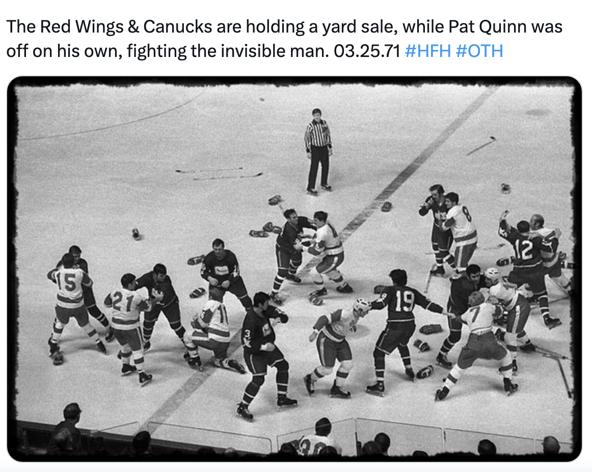 A tweet from @HistoryofFights with the caption "The Red Wings & Canucks are holding a yard sale, while Pat Quinn was off on his own, fighting the invisible man. 03.25.71 #HFH #OTH" and image of a bunch of hockey players slugging it out on the ice with their pads and gloves everything.